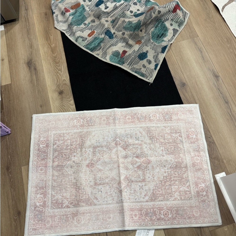 Two Ruggable 2x3 covers and rug pad.
